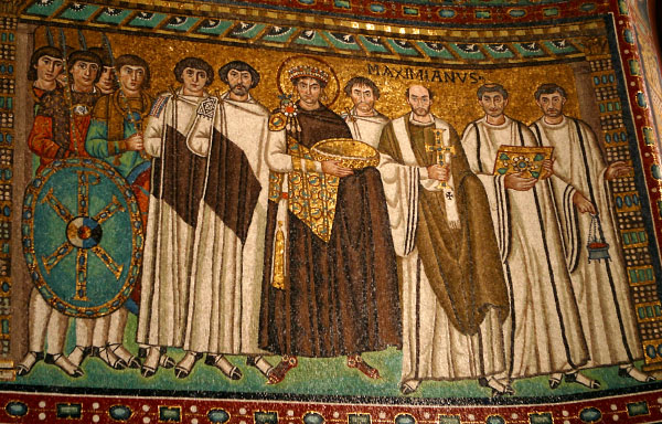 Justinian I and His court. Mosaic. Ravenna, San Vitale :: Justinian, depicted holding an offering bowl, is surrounded by soldiers and civil and ecclesiastical dignitaries.
North wall of the presbyterium.