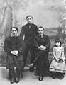 Grandfather Evdokim with the Grandchilren Aleksei, Mikhail and Verochka