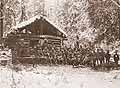 Tushnov Mikhail in the Group of Soldiers and Officers in the Winter Forest near a Small Peasant's House (Headquarters?). Carpathian Mountains. The 1-st World War. 1915