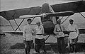 Four Pilots near an Airplane